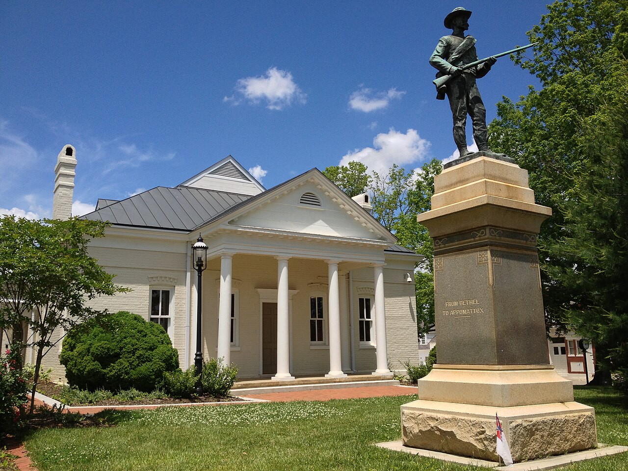 Columned Mecklenburg County Courthouse and foreground monument