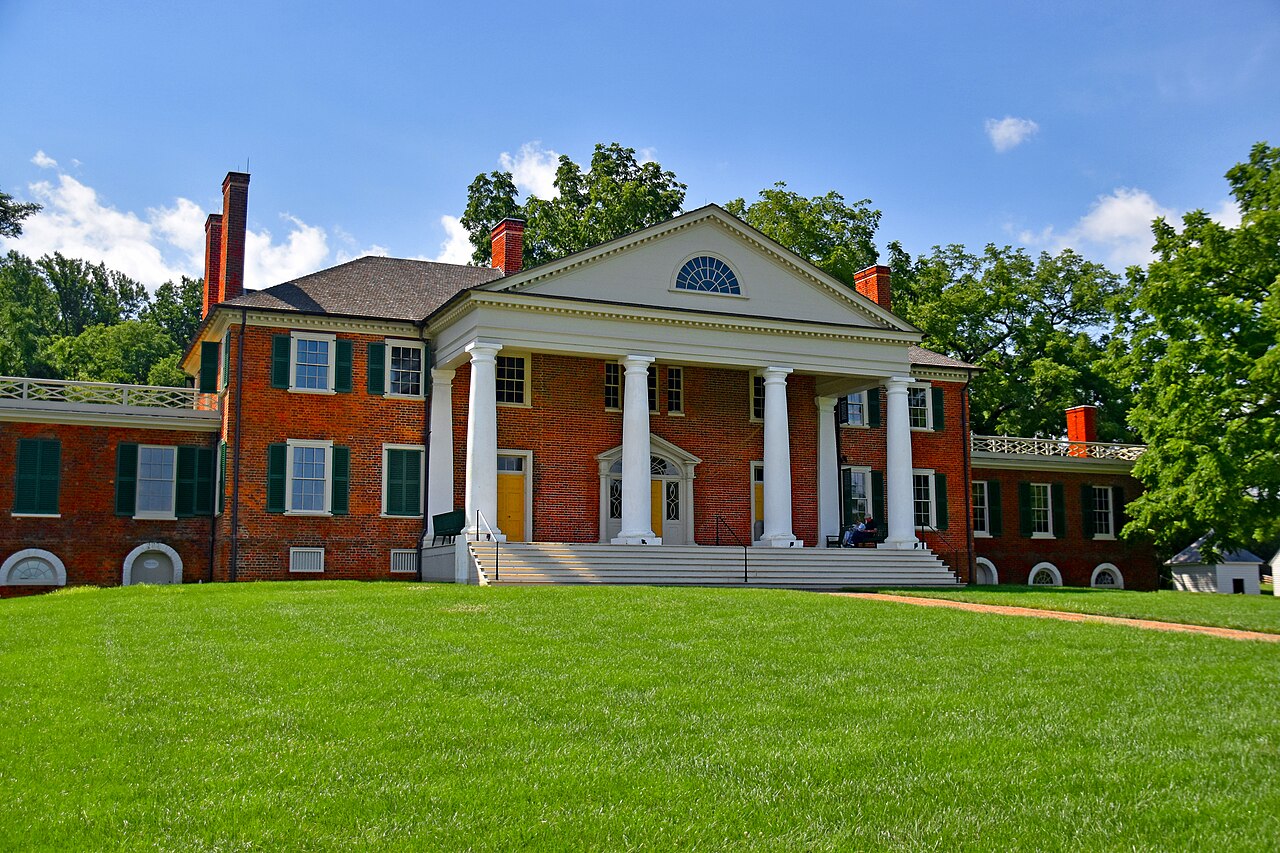 Brick facade and columned entrance of James Madison’s Montpelier